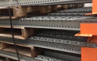 96L Used Pallet Flow Rollers with Skate Wheels and Orange Entry Guards, Galvanized - Used Racking